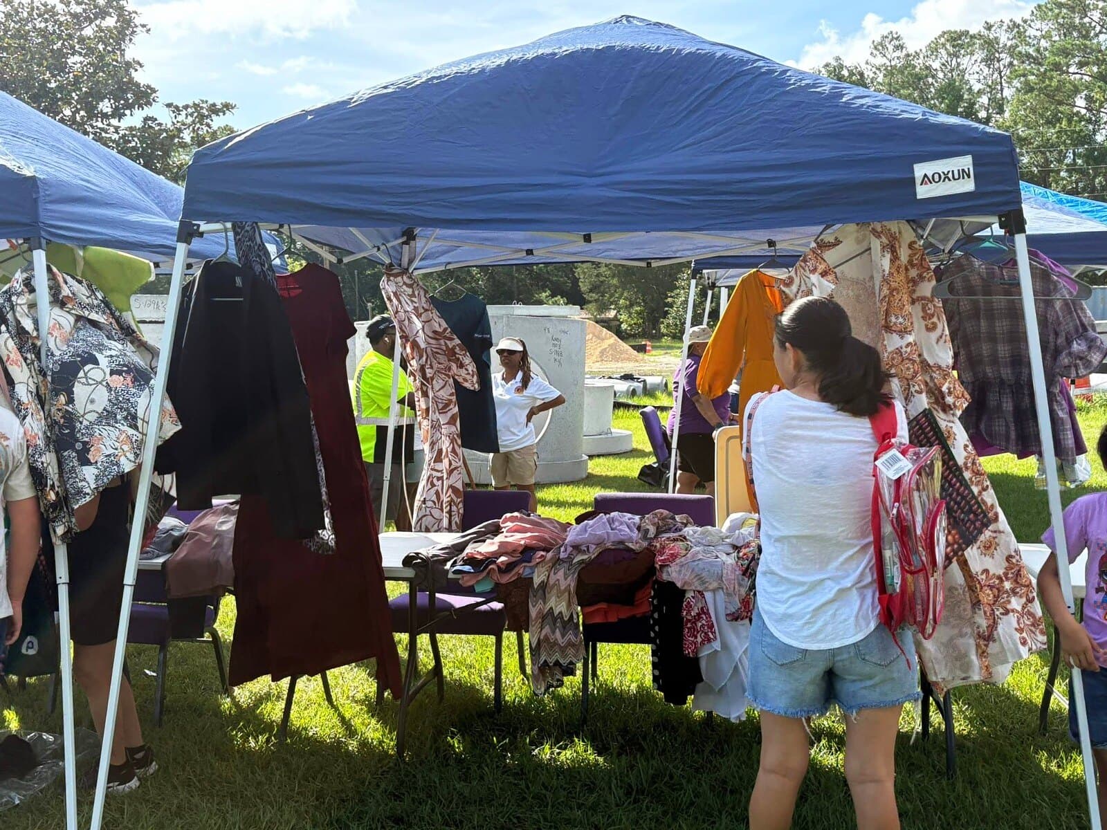 Clothing racks under the tents
